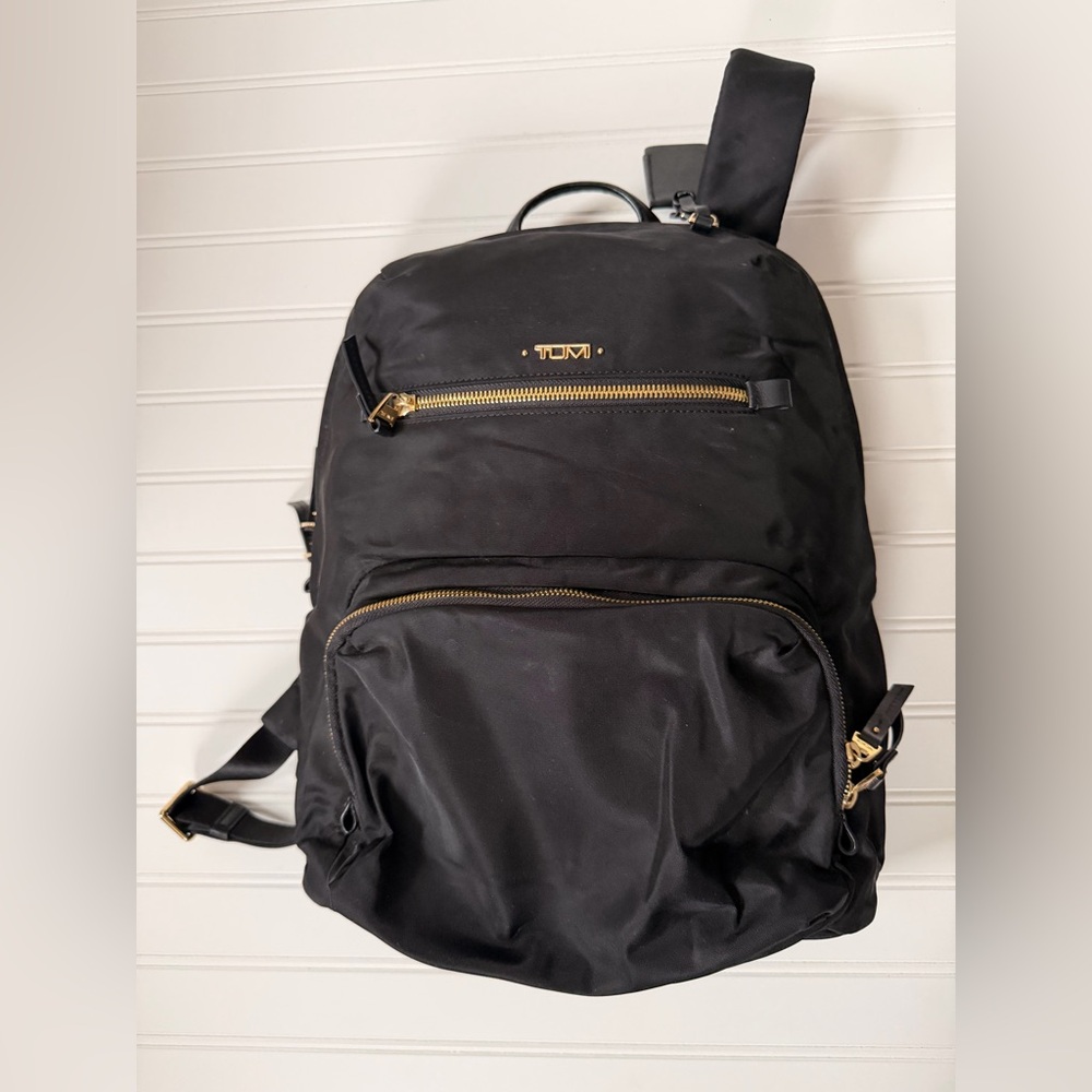 TUMI Black and Gold Backpack
